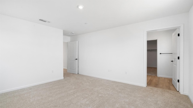 1059 Jarup Dr, Lathrop, CA 95330 - unfurnished bedroom with visible vents, a spacious closet, baseboards, and carpet floors