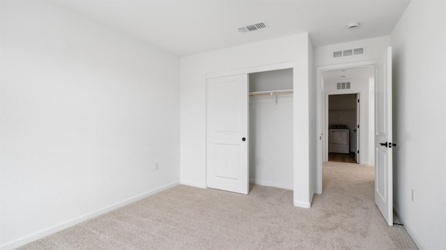 1059 Jarup Dr, Lathrop, CA 95330 - unfurnished bedroom featuring visible vents, washer / clothes dryer, and light colored carpet