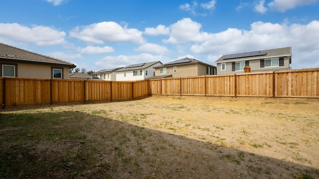 1059 Jarup Dr, Lathrop, CA 95330 - view of yard with a fenced backyard and a residential view