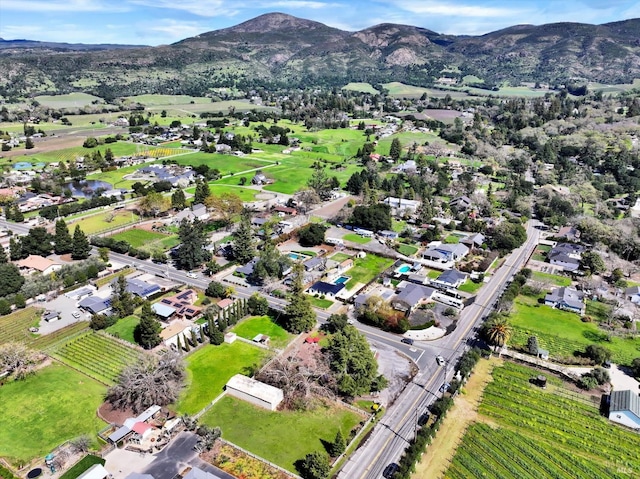 aerial view featuring a mountain view and a residential view