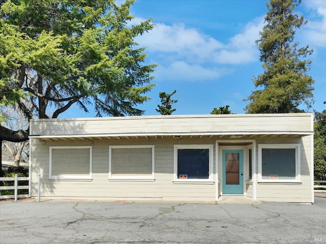 view of front of home with fence