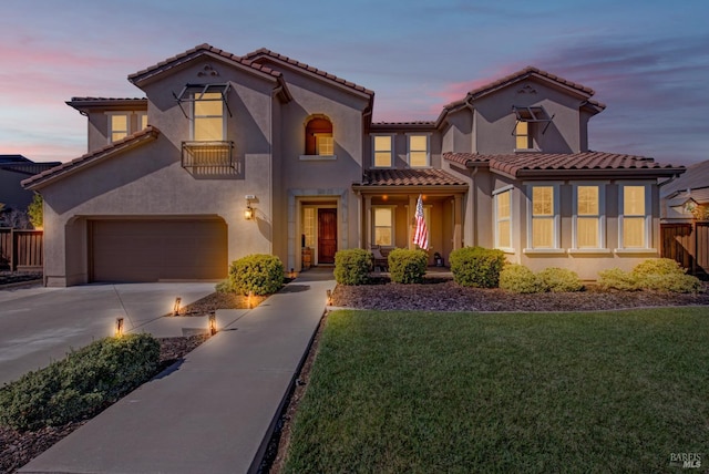 830 Elderberry Loop, Vacaville, CA 95688 - mediterranean / spanish-style home featuring fence, stucco siding, driveway, and a tiled roof