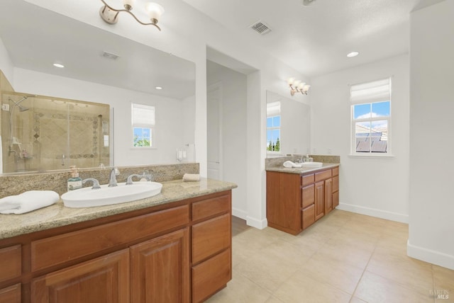 830 Elderberry Loop, Vacaville, CA 95688 - full bathroom featuring a sink, a shower stall, a healthy amount of sunlight, and visible vents