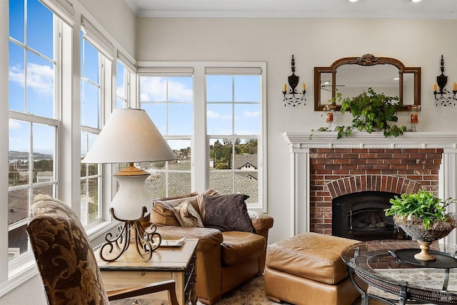 interior space with ornamental molding, recessed lighting, a wealth of natural light, and a fireplace