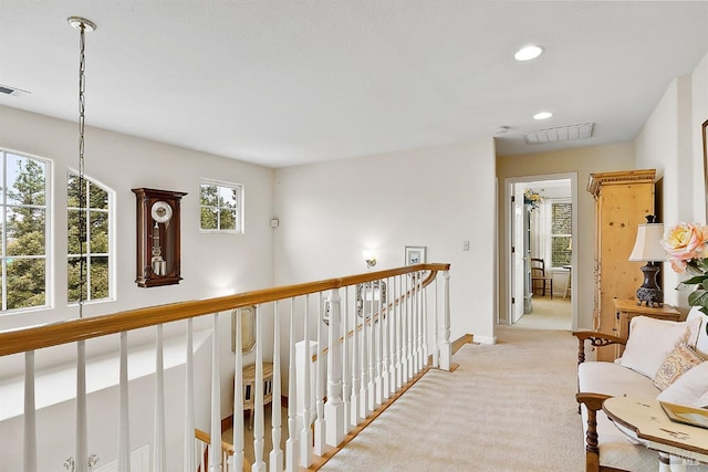 1620 Saint Francis Ct, Benicia, CA 94510 - corridor featuring light carpet, baseboards, recessed lighting, and an upstairs landing