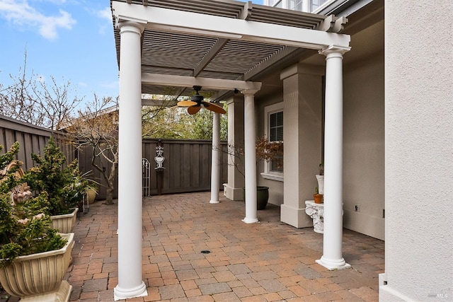 view of patio / terrace featuring ceiling fan, a fenced backyard, and a pergola