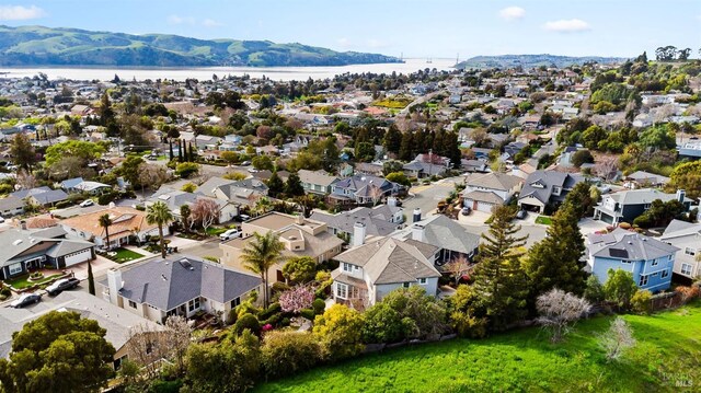 aerial view featuring a residential view and a water view