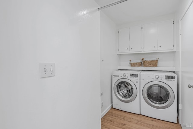 835 S Eliseo Dr, Greenbrae, CA 94904 - laundry room with separate washer and dryer, cabinet space, and light wood-style floors