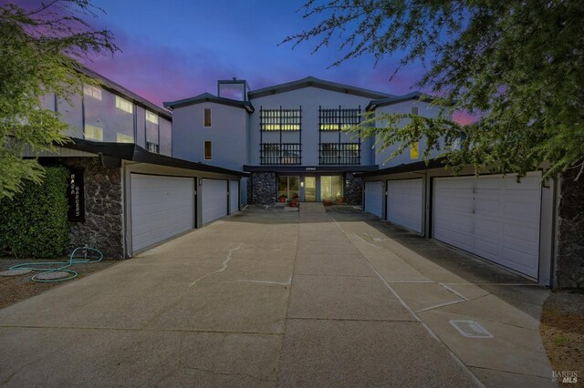 835 S Eliseo Dr, Greenbrae, CA 94904 - view of front facade featuring a balcony and stone siding