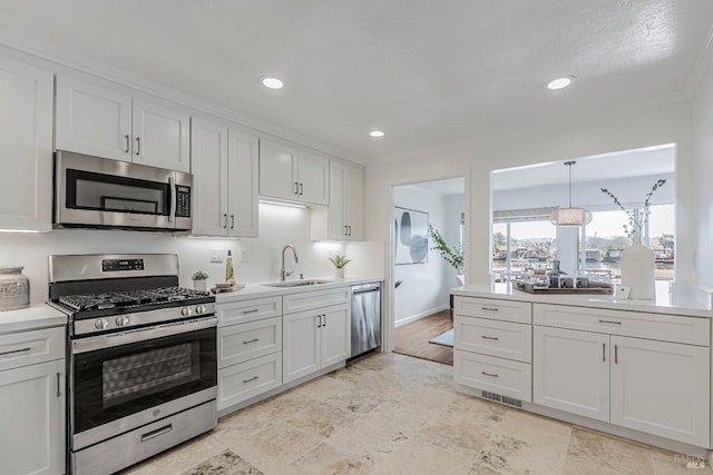 835 S Eliseo Dr, Greenbrae, CA 94904 - kitchen with stainless steel appliances, light countertops, white cabinetry, recessed lighting, and light stone finish floors