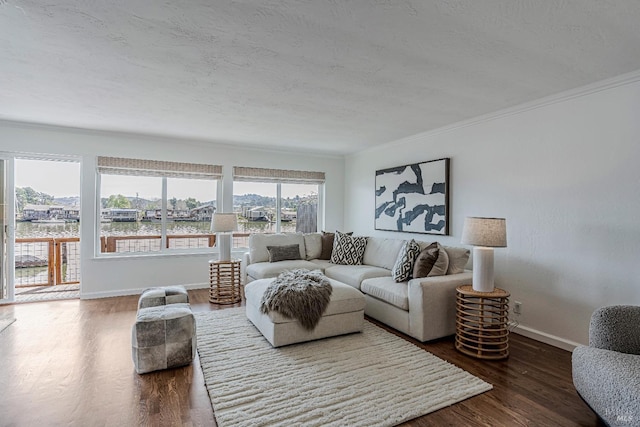835 S Eliseo Dr, Greenbrae, CA 94904 - living room featuring crown molding, dark wood finished floors, a textured ceiling, and a water view