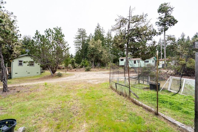 27821 Ten Mile Rd, Point Arena, CA 95468 - view of yard with an outbuilding