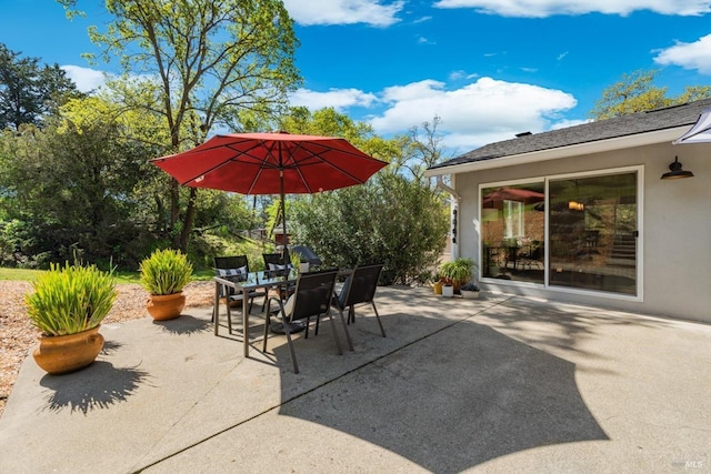view of patio featuring outdoor dining space