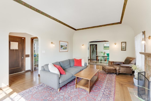 36 Wilson Ave, Vallejo, CA 94590 - living area featuring arched walkways, stairs, and a fireplace with flush hearth