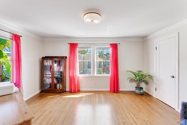 36 Wilson Ave, Vallejo, CA 94590 - empty room featuring crown molding, light wood-style flooring, and baseboards