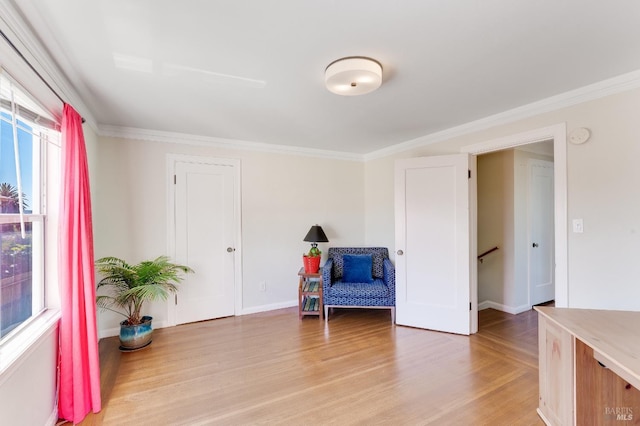 36 Wilson Ave, Vallejo, CA 94590 - sitting room with ornamental molding, baseboards, light wood-type flooring, and an upstairs landing