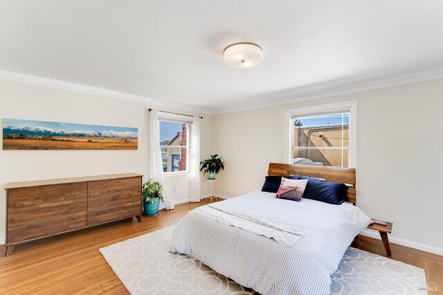 36 Wilson Ave, Vallejo, CA 94590 - bedroom featuring multiple windows, ornamental molding, and light wood finished floors