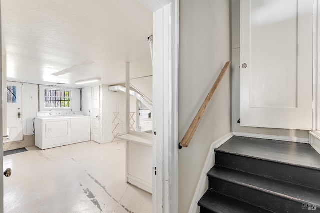 36 Wilson Ave, Vallejo, CA 94590 - staircase with washing machine and clothes dryer and finished concrete flooring