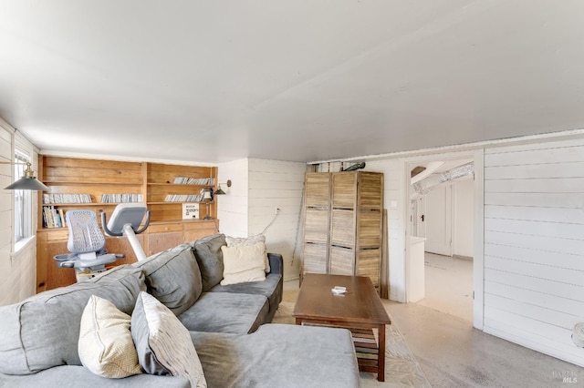 36 Wilson Ave, Vallejo, CA 94590 - living area with wooden walls and concrete floors