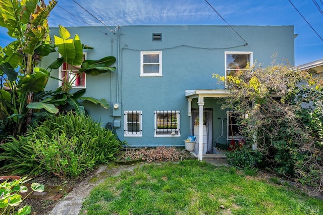 36 Wilson Ave, Vallejo, CA 94590 - back of house with stucco siding and visible vents