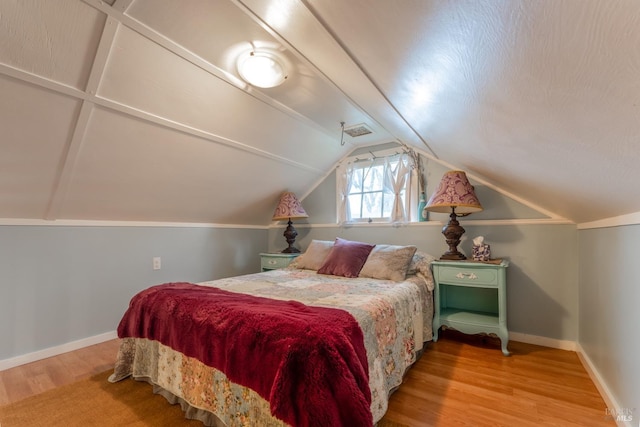 701 W Clay St, Ukiah, CA 95482 - bedroom with visible vents, baseboards, lofted ceiling, and wood finished floors