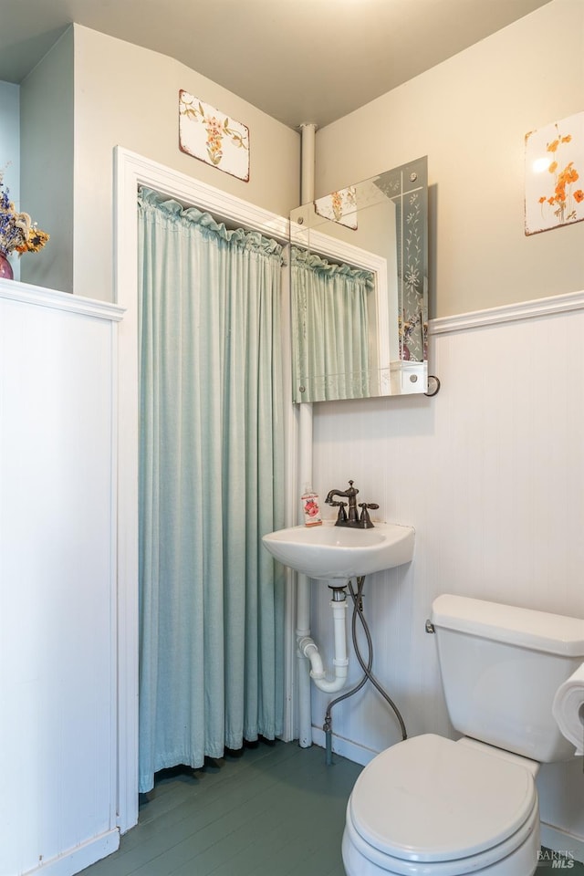 701 W Clay St, Ukiah, CA 95482 - bathroom with a wainscoted wall and toilet