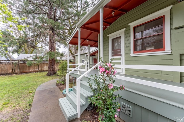 701 W Clay St, Ukiah, CA 95482 - exterior space featuring a lawn, covered porch, and fence