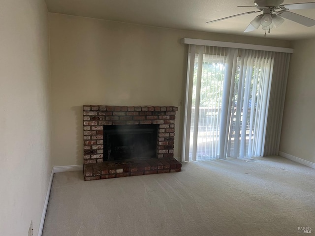 9570 Orion Dr, Windsor, CA 95492 - living room with carpet flooring, ceiling fan, a brick fireplace, and baseboards