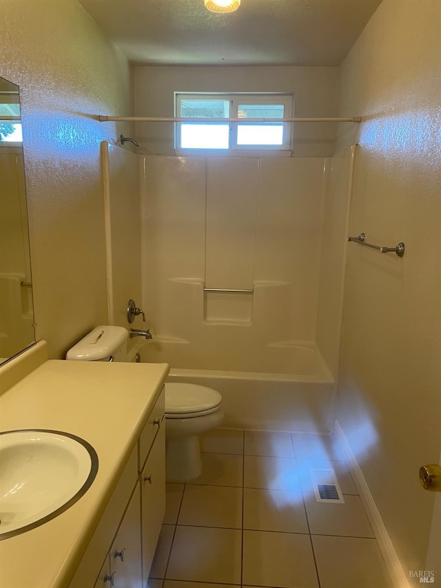 9570 Orion Dr, Windsor, CA 95492 - bathroom featuring vanity, toilet, tile patterned floors, and bathing tub / shower combination
