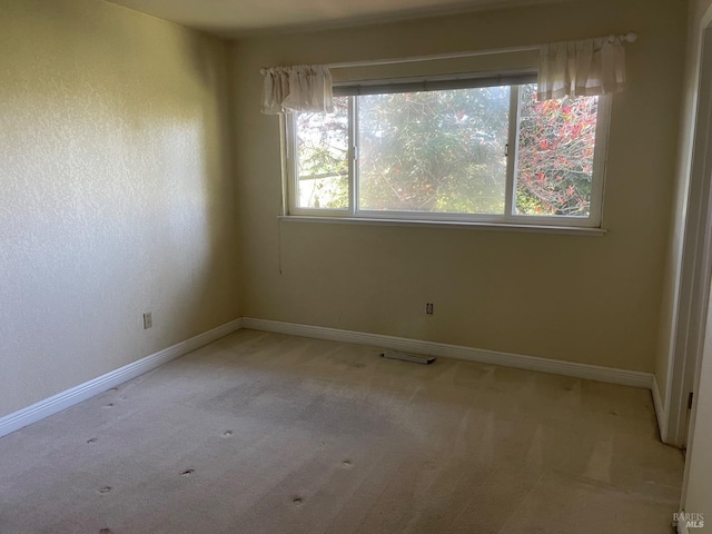 9570 Orion Dr, Windsor, CA 95492 - spare room with light colored carpet and baseboards
