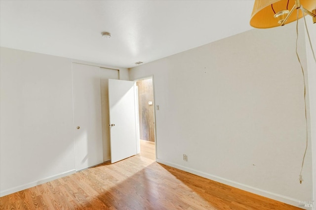1014 Falcon Dr, Vallejo, CA 94589 - unfurnished room with visible vents, wood finished floors, and baseboards