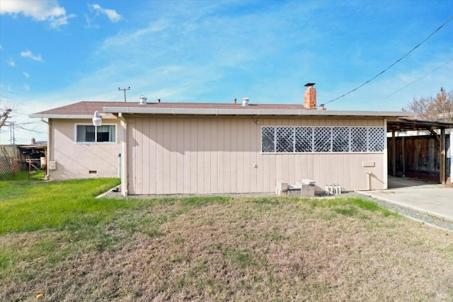 1014 Falcon Dr, Vallejo, CA 94589 - rear view of house with a yard and fence