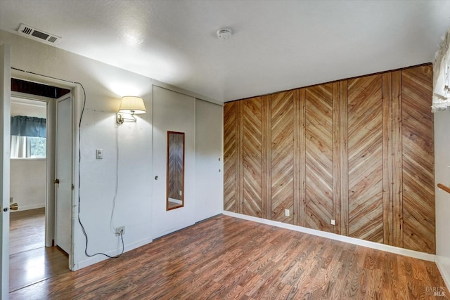 1014 Falcon Dr, Vallejo, CA 94589 - empty room with visible vents and wood finished floors