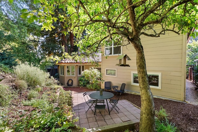back of property with a patio area