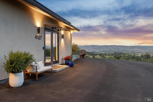 view of patio / terrace with a mountain view