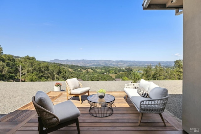 4127 Dry Creek Rd, Napa, CA 94558 - wooden deck featuring an outdoor living space, a view of trees, and a mountain view