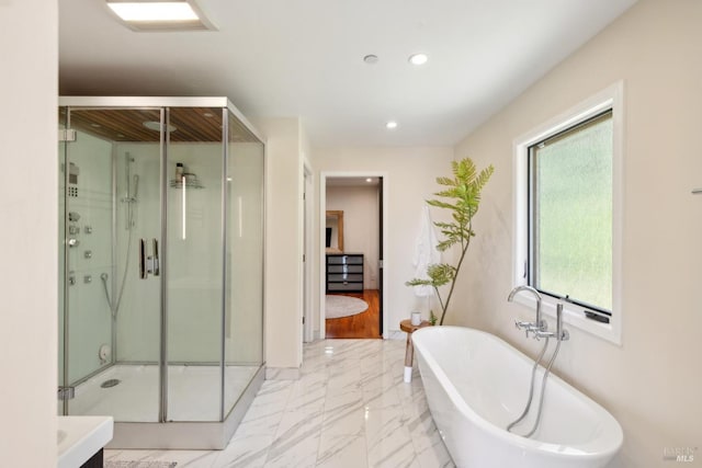 4127 Dry Creek Rd, Napa, CA 94558 - full bath featuring a stall shower, a soaking tub, marble finish floors, and recessed lighting