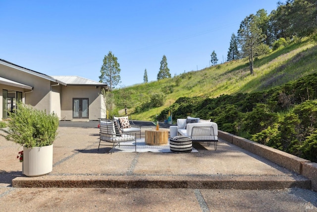 view of patio / terrace with french doors and an outdoor hangout area