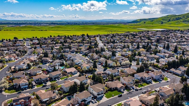 birds eye view of property with a residential view
