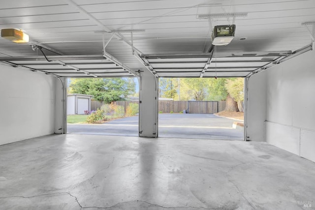 garage featuring a garage door opener