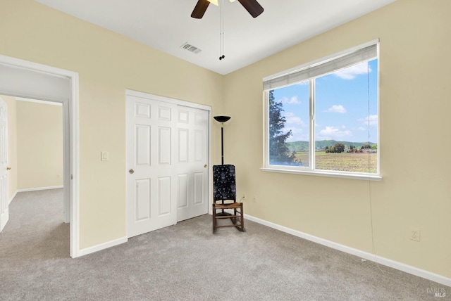 bedroom with visible vents, baseboards, and carpet