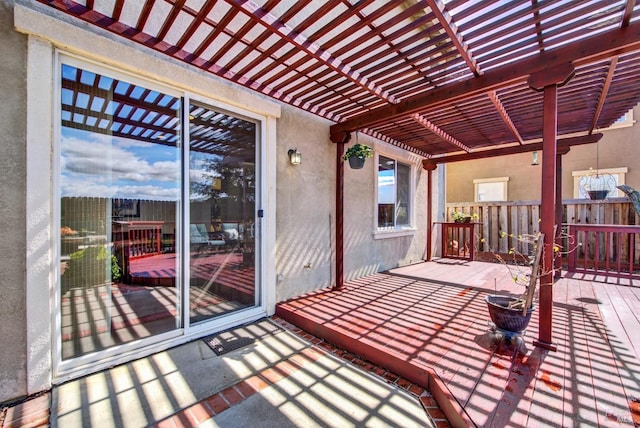 wooden deck with a pergola