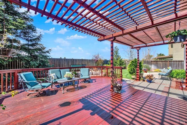 wooden terrace with a fenced backyard and a pergola