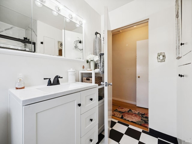bathroom featuring tile patterned floors and vanity