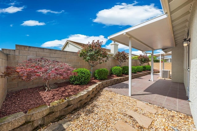 exterior space with a fenced backyard
