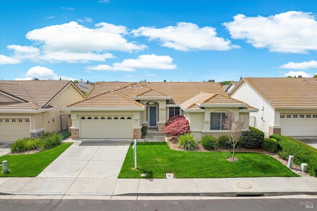 ranch-style house with a tile roof, stucco siding, an attached garage, driveway, and a front yard