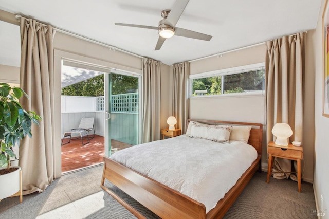 bedroom with access to exterior and a ceiling fan