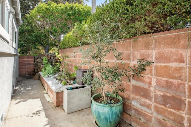 view of patio / terrace with fence