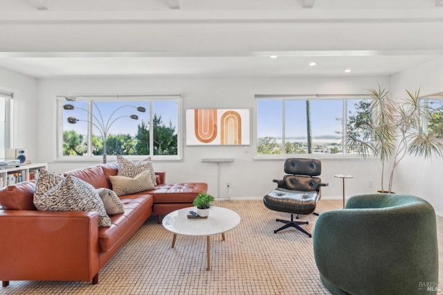 living room featuring recessed lighting and baseboards
