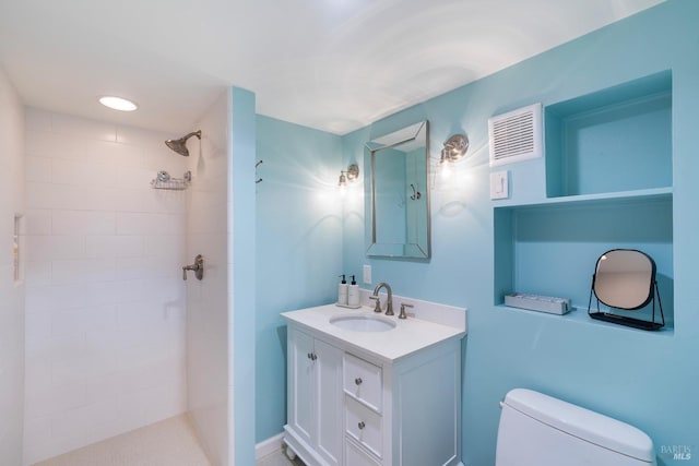 603 Sunnyside Rd, Saint Helena, CA 94574 - full bathroom with visible vents, toilet, a tile shower, and vanity